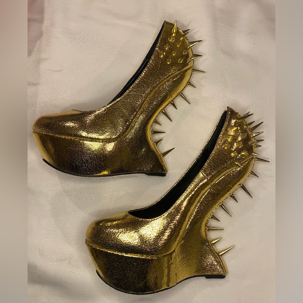 Gold spiked floating heels